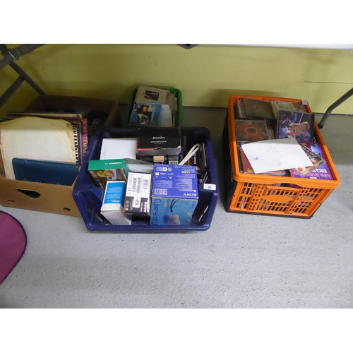 90 - Four boxes of mostly CDs and old electricals