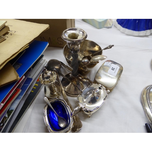 39 - A collection of silver items - bowl, spoons, tongs, candlestick etc.