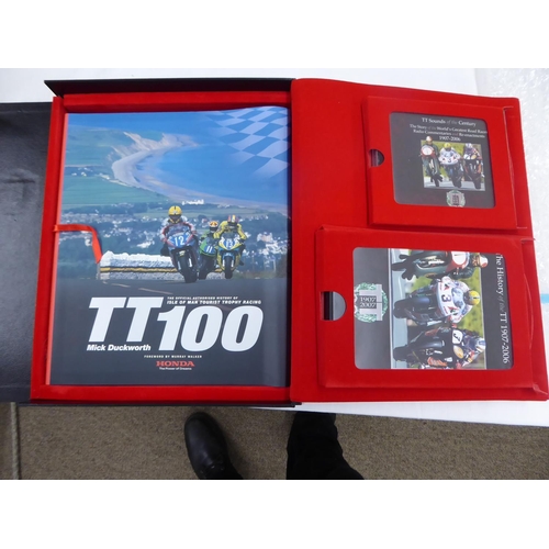 369 - A TT Centenary Collection Presentation Box with official crowns, post cards, CD's, book, L/E No. 109... 