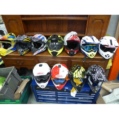 134 - Eleven assorted helmets