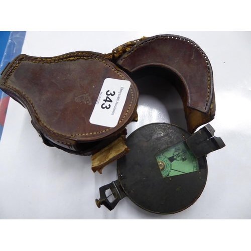 343 - A late 19thC military compass by J Hicks London in its leather case