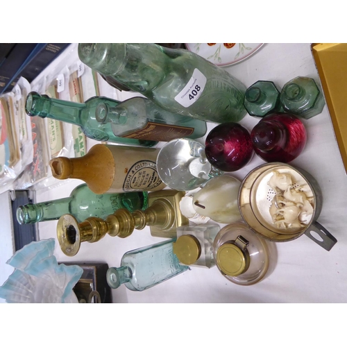 408 - A collection of glass bottles manx noted, ink wells etc