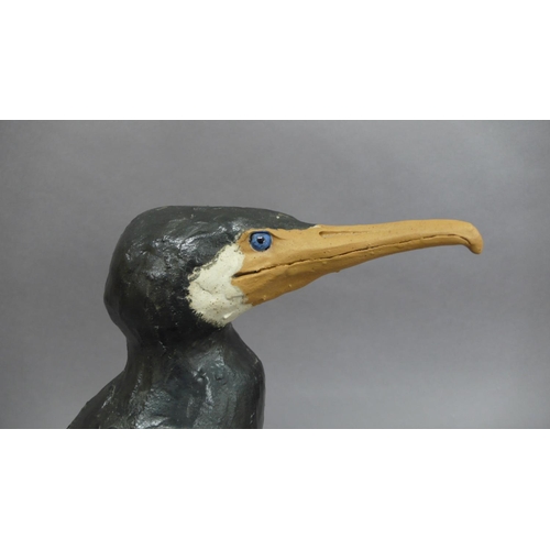 13 - A studio pottery cormorant with impressed mark to base - ht. 13.5 ins