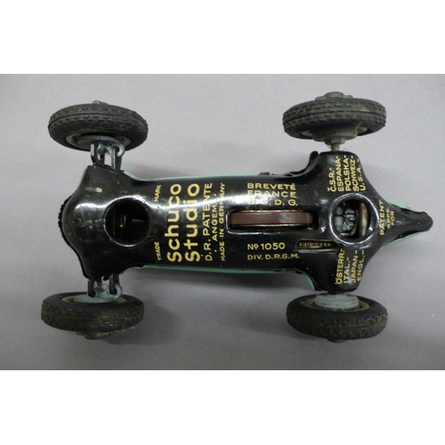 48 - A Schuco clockwork tinplate Mercedes racing car