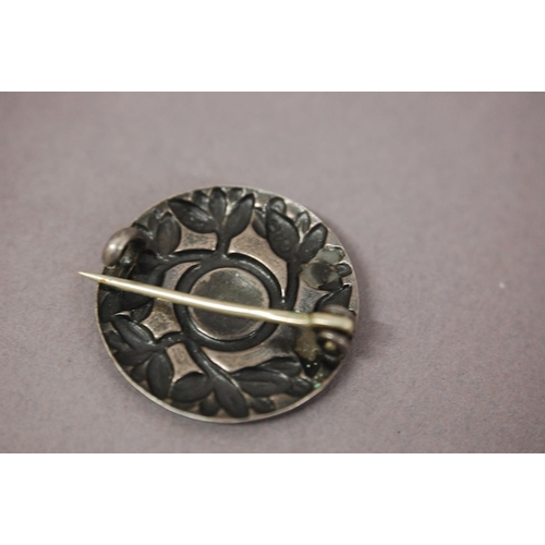 307 - Charles Horner chased silver and blue enamel brooch - Chester 1923