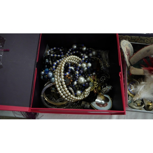 344 - A box of costume jewellery