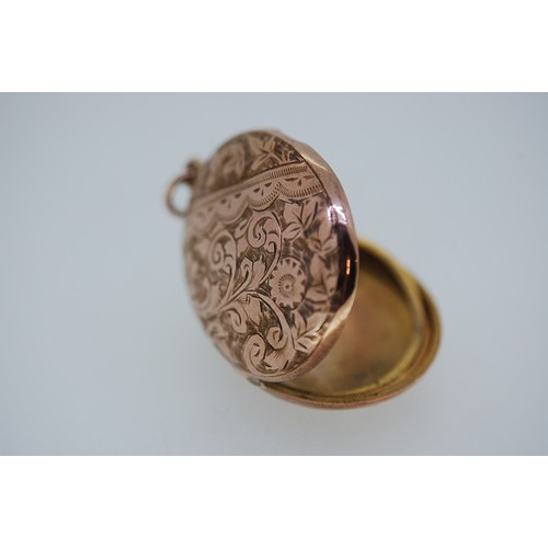 421 - 9 ct. rose gold locket (all gold)