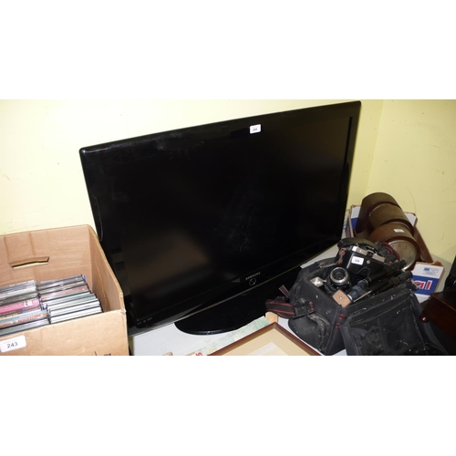 114 - Flat screen television with cables