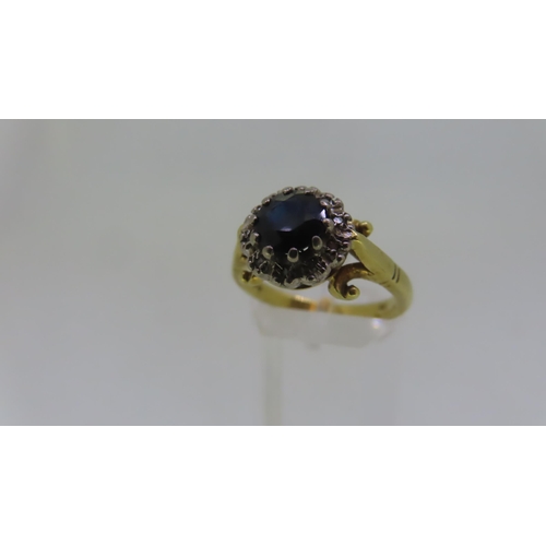 37 - 18ct gold sapphire and diamond ring