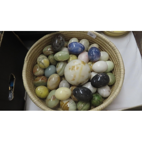 167 - A large collection of onyx marble and alabaster eggs