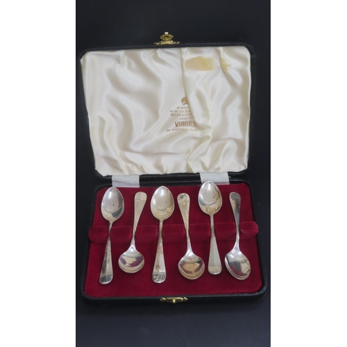 303 - A cased set of silver coffee spoons Sheffield 1938