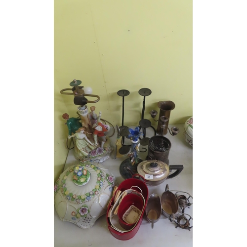 87 - Collection of figure lamps candle holders metal ware etc