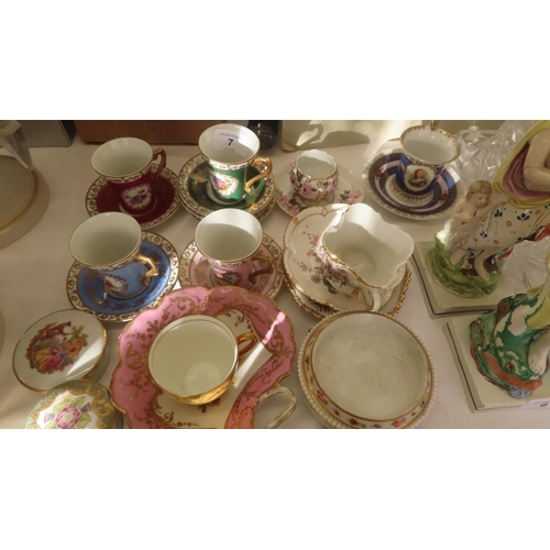 7 - A collection of porcelain coffee cups etc