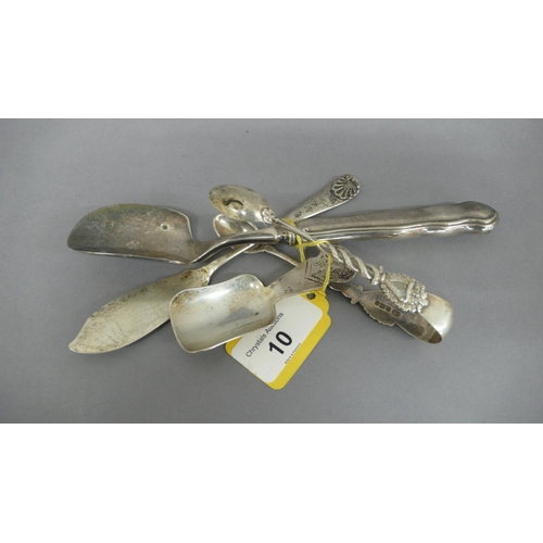 10 - Silver caddy spoon, stilton scoop, butter knife and sugar tongs with Irish decoration