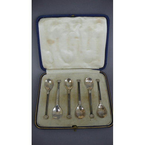 12 - A cased set of Ionian column silver coffee spoons, Sheffield 1928 (cased)