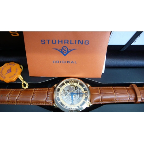 30 - A Stuhrling automatic Gent's skeleton watch (boxed with papers etc)