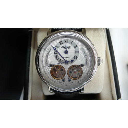 31 - An Ingersoll Gent's automatic twin balance prime regulator wrist watch (boxed with papers etc)