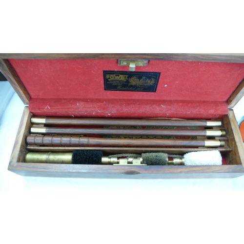 196 - A cased Powell & Son shot gun cleaning kit