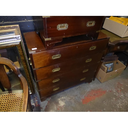 30 - Campaign chest of four long drawers, with brass handles and corners