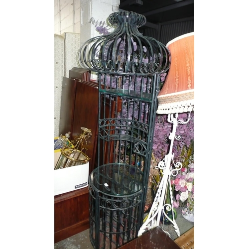 12 - Cast metal wine rack with fancy storage unit above, plus metal floor standing lamp