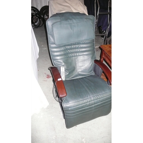 23 - A Green Faux leather massage chair