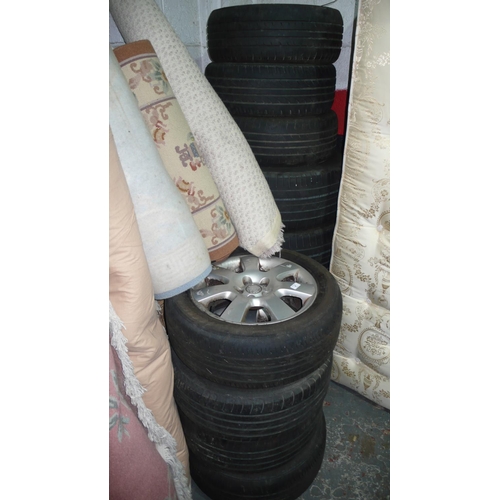 4 - Four BMW wheels and tyres, four VW wheels and tyres plus three