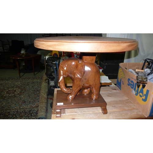 50 - Polished elephant stand with 2' diameter coffee table top