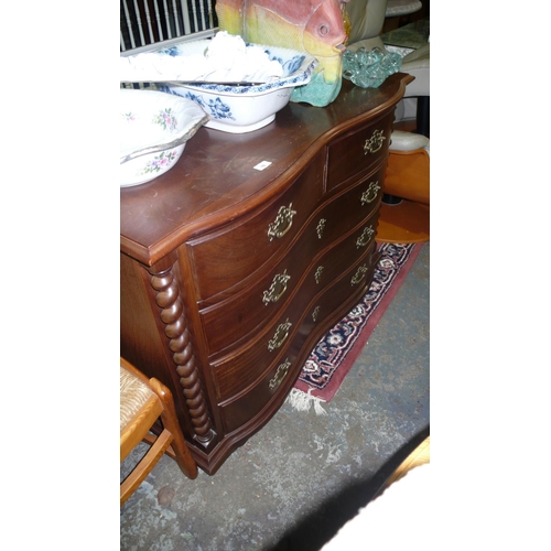 76 - Serpentine fronted chest of three long and two short drawers with barley twist columns to sides and ... 