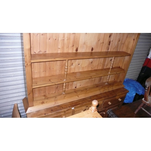 90 - Large pine dresser with cupboards and three drawers to base and two shelves to top with wooden knob ... 