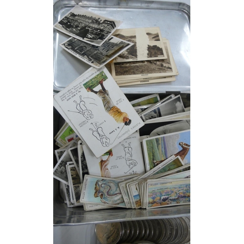 388 - A tin of old cigarette cards