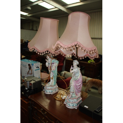 11 - Two matching table lamps in the form of a gent and a lady