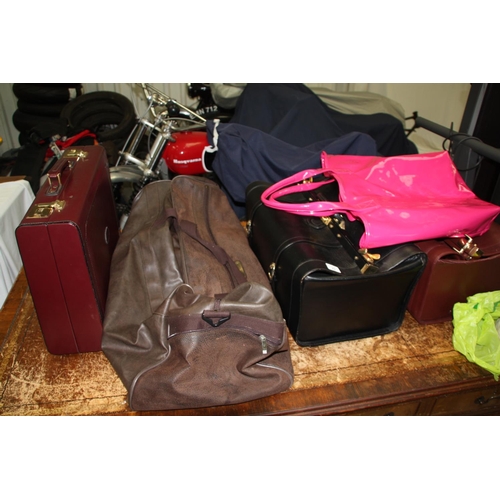 23 - Collection of leather bags and a briefcase