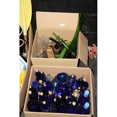 31 - Large assortment of blue bottles, vases etc