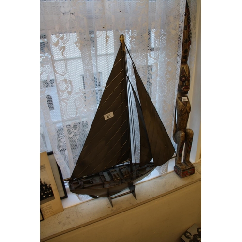 19 - A metal model yacht - ht. 30 ins approx