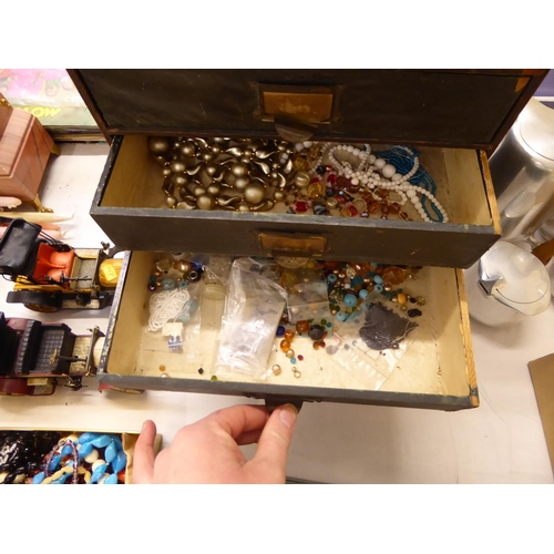 26 - Six drawer cabinet containing beads and necklaces