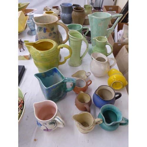 130 - Large collection of assorted jugs in various patterns and colours