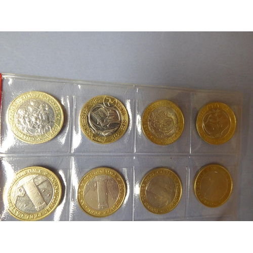 83 - A good collection of Isle of Man £2 coins including Christmas, Round Tower, Racing etc.