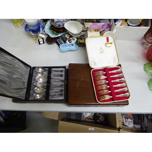 238 - Four cased sets of cutlery