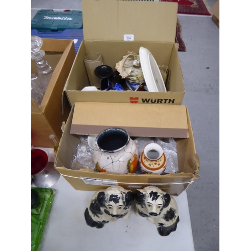 234 - Two boxes of crockery, ornaments and knick knacks including Coronation ware plus a pair of pot dogs