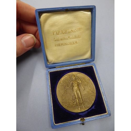 76 - A cased Olympic Games of London 1908 Donor bronze medallion