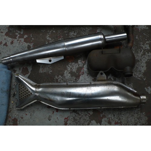 103 - Collection of motorcycle exhausts and silencers including Fishtail and Ducati