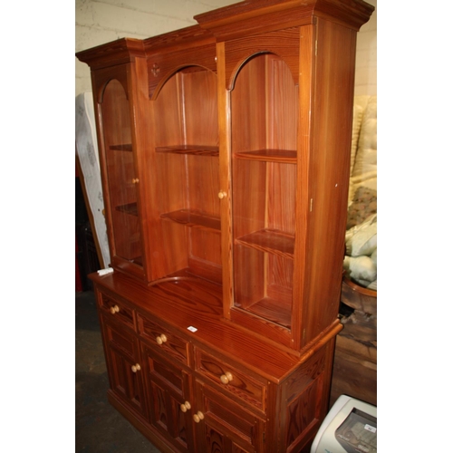 31 - Display cabinet with two glass doors and cupboards and drawers to base.