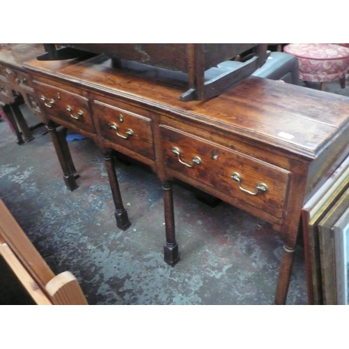 14 - Elm 18thC dresser with three drawers on turned legs with block feet