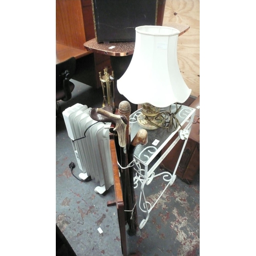 50 - Fire screen, conservatory table, lamp and walking sticks