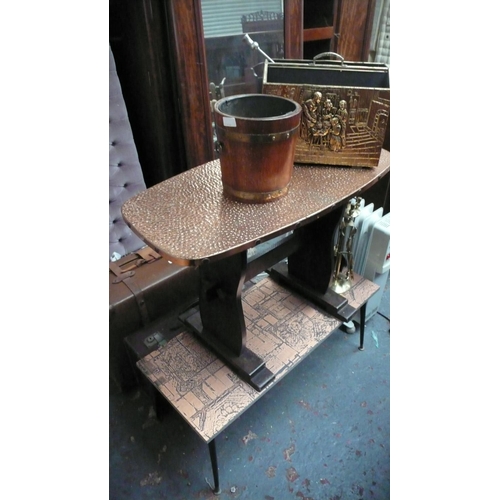 52 - Two copper topped tables, electric heater, brass fire irons, magazine rack and bucket