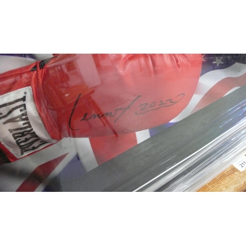 210 - Well framed signed Lennox Lewis and Mike Tyson boxing gloves