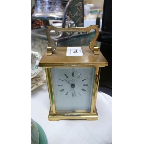 144 - A carriage clock with quartz movement