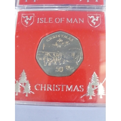 328 - Nine 1985 Isle of Man Christmas fifty pence pieces (50p) - De Havilland Rapide