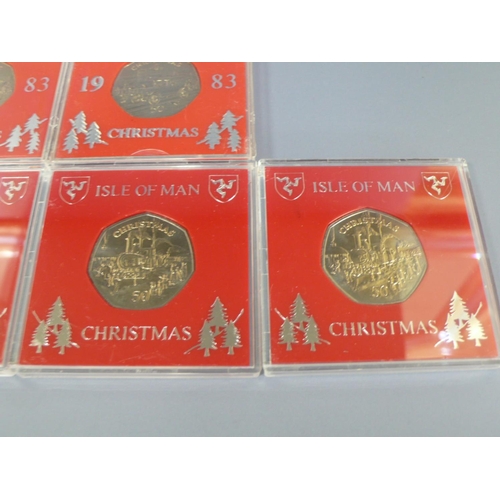 335 - Ten Isle of Man Christmas fifty pence pieces (50p) - 4 x 1984 Steam Train & 6 x 1983 T-Ford