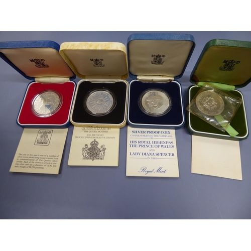 87 - Four cased silver crowns to celebrate Royal weddings and anniversaries